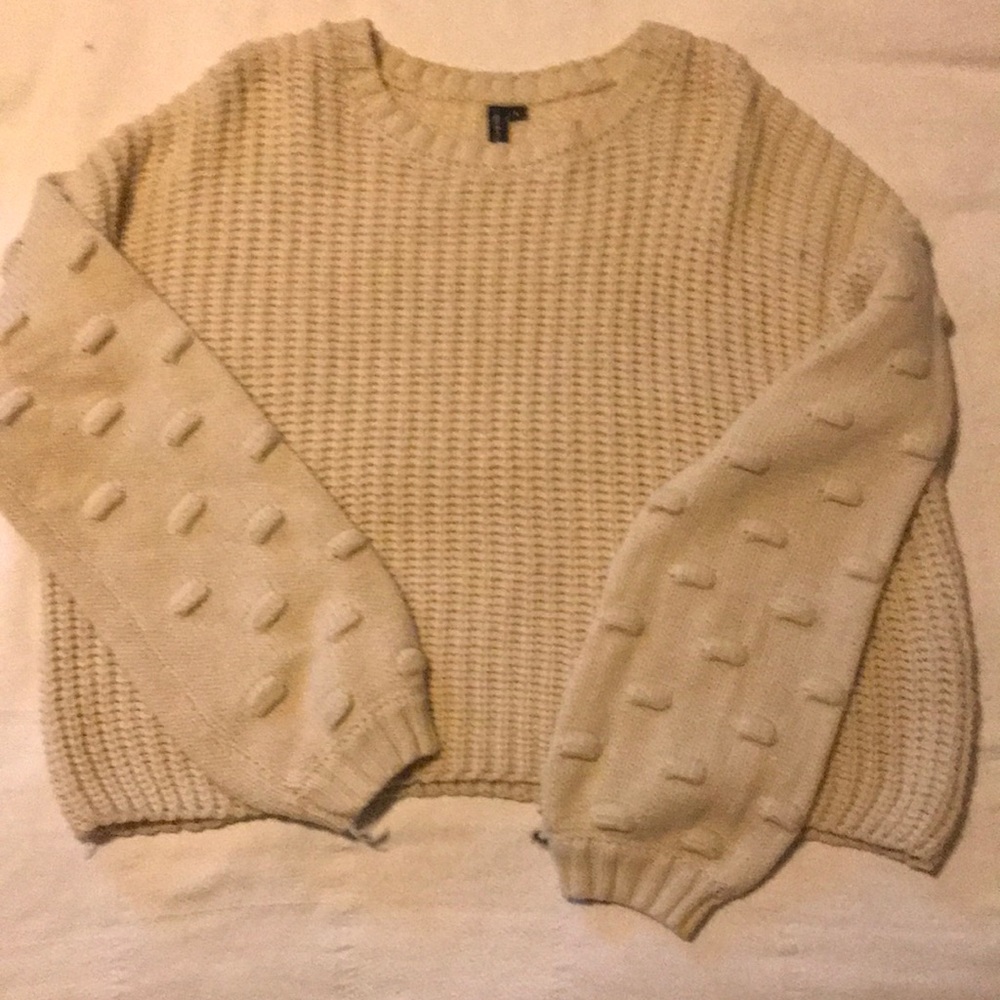 L cream sweater